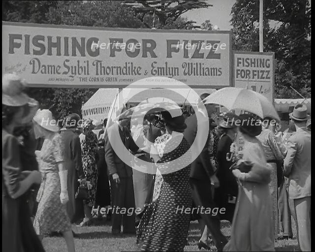 Male and Female Patrons at  a Theatrical Garden Party at  the Ranelagh Club, Barnes..., 1939. Creator: British Pathe Ltd.