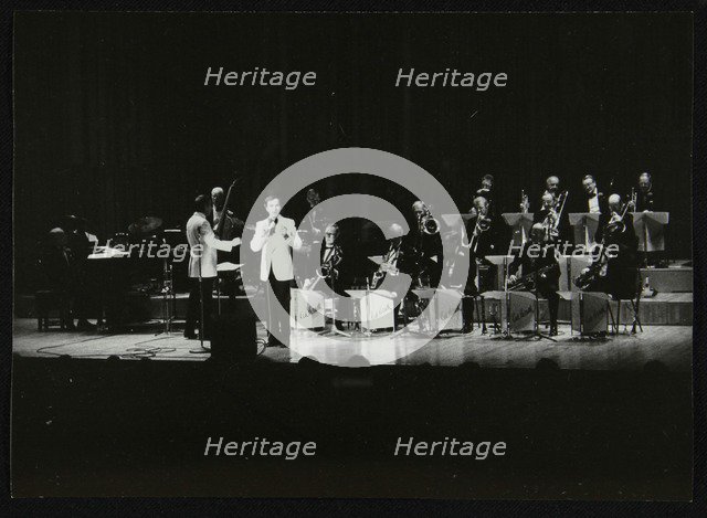 The Ted Heath Orchestra in concert at the Barbican Hall, London, December 1985. Artist: Denis Williams