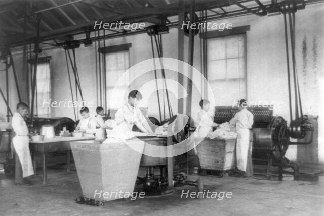 United States Indian School, Carlisle, Pennsylvania, six boys doing laundry, 1901. Creator: Frances Benjamin Johnston.