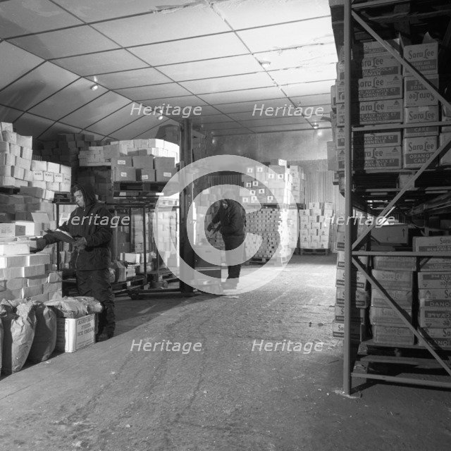Workers in a cold store at Modern Foods, Mexborough, South Yorkshire, 1973. Artist: Michael Walters