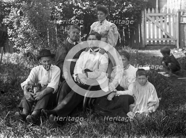 Unknown family portrait, c1900s. Creator: Robert Augustus Henry L'Estrange.