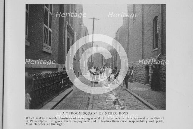 A "broom squad" of Negro boys; Which makes a regular business of sweeping several of the..., 1908. Creators: Unknown, Doubleday Page and Company.