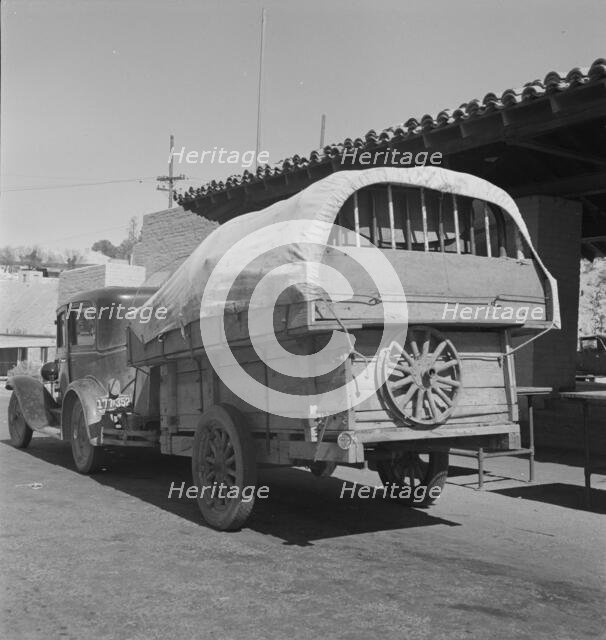 Migrant family stopped at the California-Arizona state line, Yuma, Arizona, 1937. Creator: Dorothea Lange.