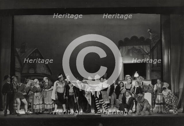 Pinocchio cast with man pointing sticks, 1938-1939. Creator: Unknown.