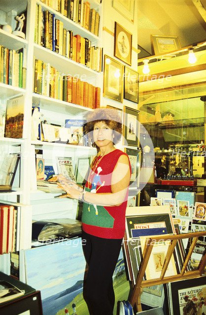 Author Sarah Fabian Baddiel at home with some of her golfing collection. Artist: Unknown