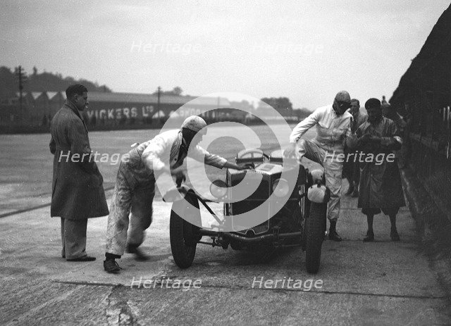 RL Bellamy's Frazer-Nash in the pits at a JCC Members Day, Brooklands. Artist: Bill Brunell.