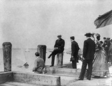 Group of well-dressed people on dock during yacht race, Oyster Bay, Long Island, N.Y., 1905. Creator: Frances Benjamin Johnston.
