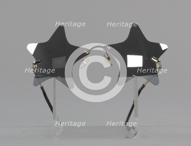 Bootsy Collins style star-shaped mirrored lens sunglasses, 1993-2013. Creator: elope, inc..