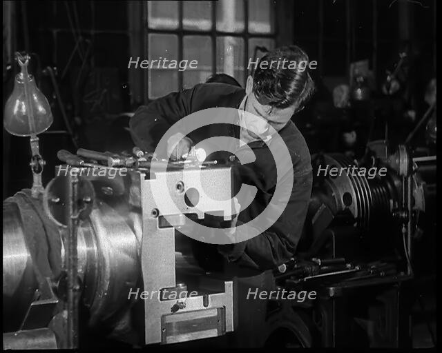 A Man Working in a Factory, 1940. Creator: British Pathe Ltd.