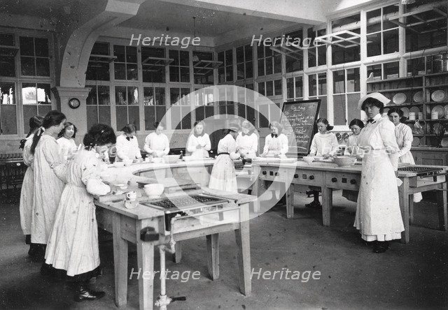 Girls domestic class, Rowntree’s factory, York, Yorkshire, 1913. Artist: Unknown
