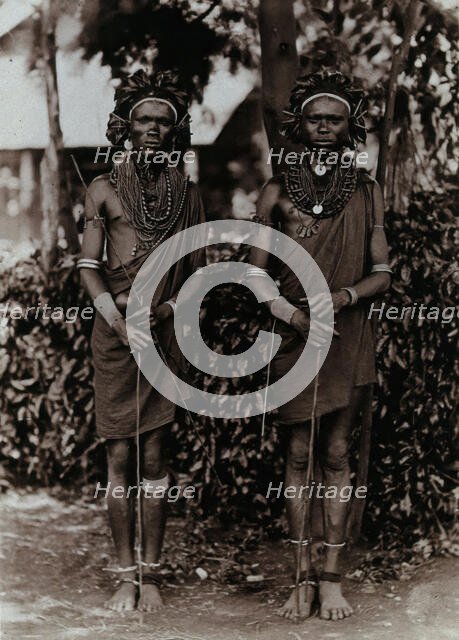 Two young Kikuyu men, carrying sticks, c1900. Creator: Unknown.