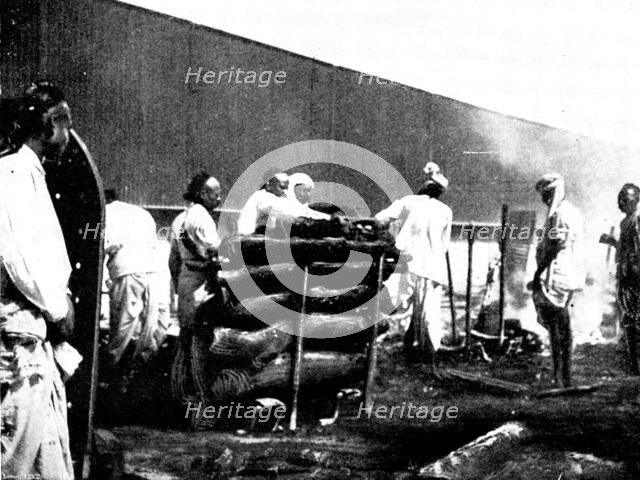 Scenes in Plague-Stricken Bombay: performing the final ceremonies at a high-caste funeral..., 1898. Creator: Gysi.