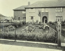 Front garden of 61 Barnes Avenue, on the Castelnau Estate,  Barnes, London, 1930 Artist: Unknown.