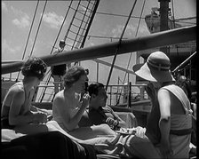 A Group of People on the Deck of a Cruise Liner at Sea, 1931. Creator: British Pathe Ltd.