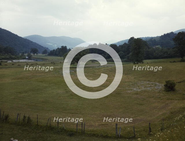 Farmland along the upper Delaware River in New York state, 1943. Creator: John Collier.