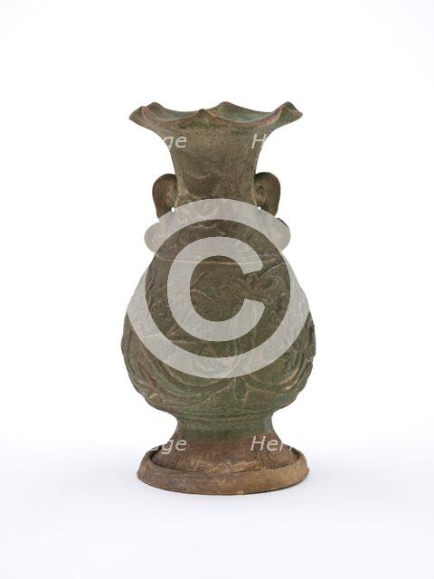 Vase with fluted mouth and molded floral design, early 1200s. Creator: Unknown.