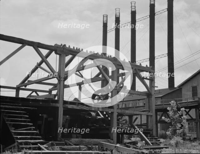 Lumber mill being dismantled at Careyville, Florida, 1937. Creator: Dorothea Lange.