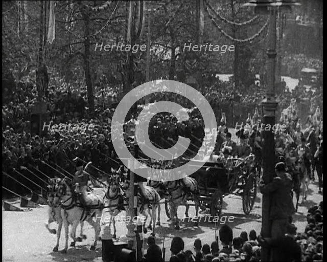 Crowd Watching the Silver Jubilee Parade of George V, His Majesty The King, 1936. Creator: British Pathe Ltd.