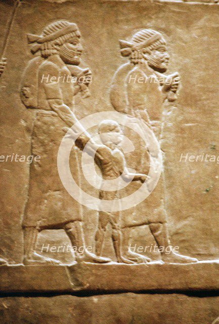 Assyrian relief of refugees. Artist: Unknown