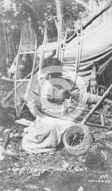 Woman making snow shoes, between c1900 and c1930. Creator: Unknown.
