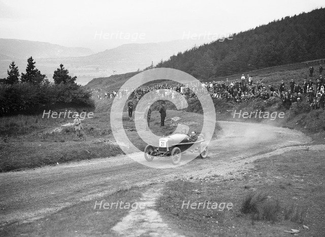 Aston Martin Bunny of Frank B Halford competing in the Caerphilly Hillclimb, Wales, 1923. Artist: Bill Brunell.
