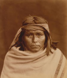 Tah-Lay, Apache? Indian, head-and-shoulders portrait, facing front, wearing blanket and..., c1903. Creator: Edward Sheriff Curtis.