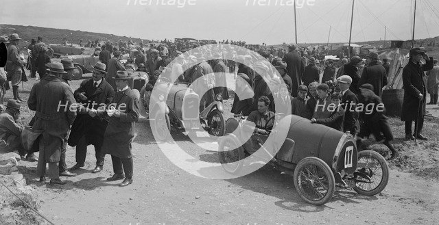Raymond Mays' Bugatti Brescia and JS Chance's Enfield Allday, Porthcawl Speed Trials, Wales, 1922. Artist: Bill Brunell.