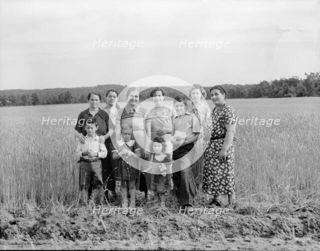 Wives and children of the farm group, Hightstown, New Jersey, 1936. Creator: Dorothea Lange.