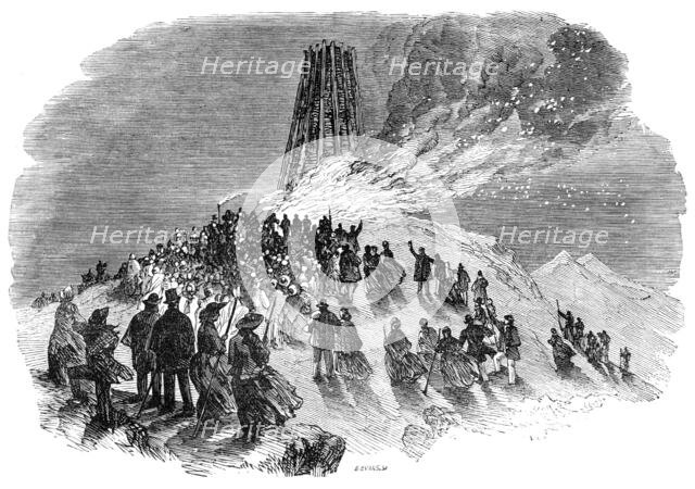 The lighting of the Malvern Monster Beacon, 1856.  Creator: Edmund Evans.