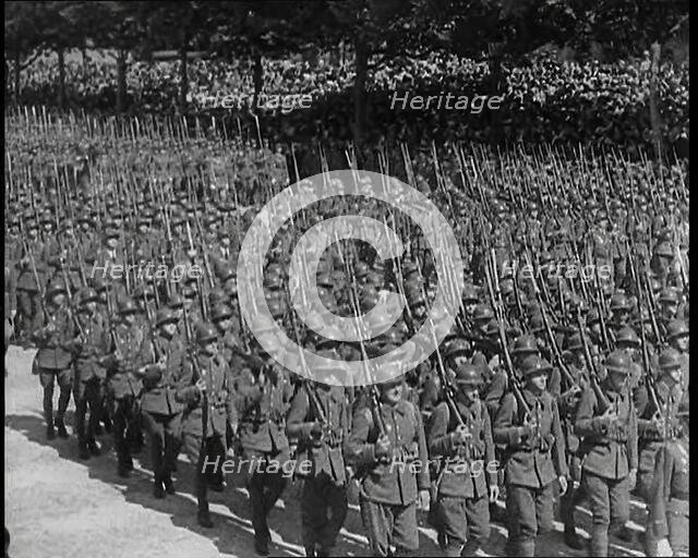 Lines of Male French Soldiers Marching Down the Champs Elysees During a Bastille Day..., 1939. Creator: British Pathe Ltd.