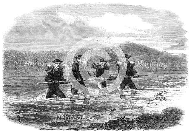 An Exploring Party on the West Coast of New Zealand: crossing the River Teramakau, 1865. Creator: Unknown.