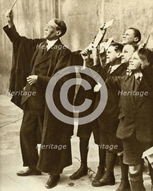 Schoolboys and teacher observing a solar eclipse, Britain, 1921, (1935). Creator: Unknown.