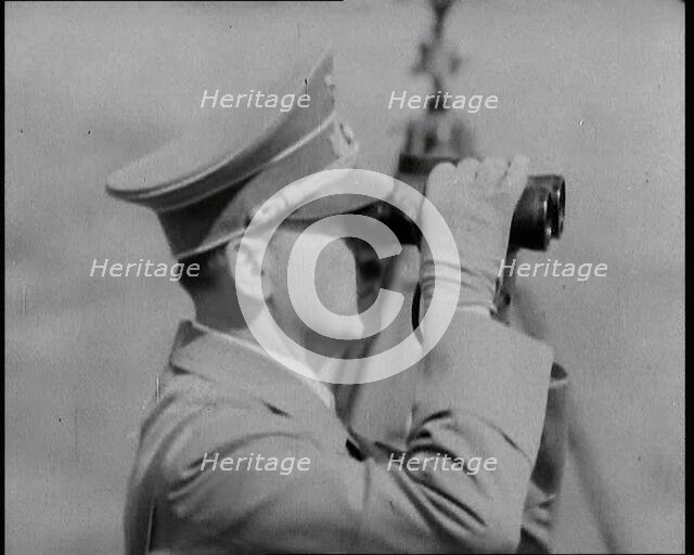 Adolf Hitler, the German Leader Looking Through Binoculars at Army Manoeuvres, 1937. Creator: British Pathe Ltd.
