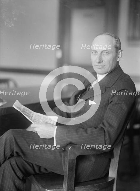 Howard Earle Coffin - At Desk, 1917. Creator: Harris & Ewing.