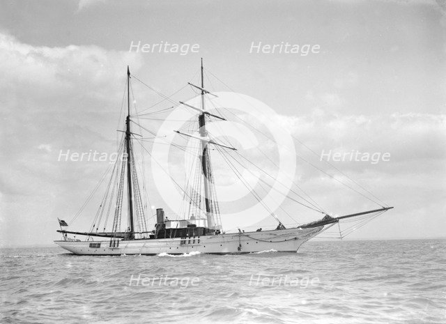 The sailing yacht 'Sea Belle' under way, 1911.  Creator: Kirk & Sons of Cowes.