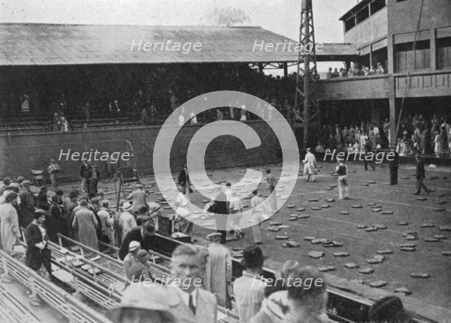 The cushion bombardment of No 1 Court, Davis Cup, Wimbledon, 1935. Artist: Planet News Ltd