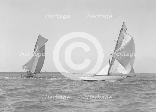 The 8 Metre 'Antwerpia' (H19) and 'Windflower' (H3) racing under spinnaker, 1911. Creator: Kirk & Sons of Cowes.