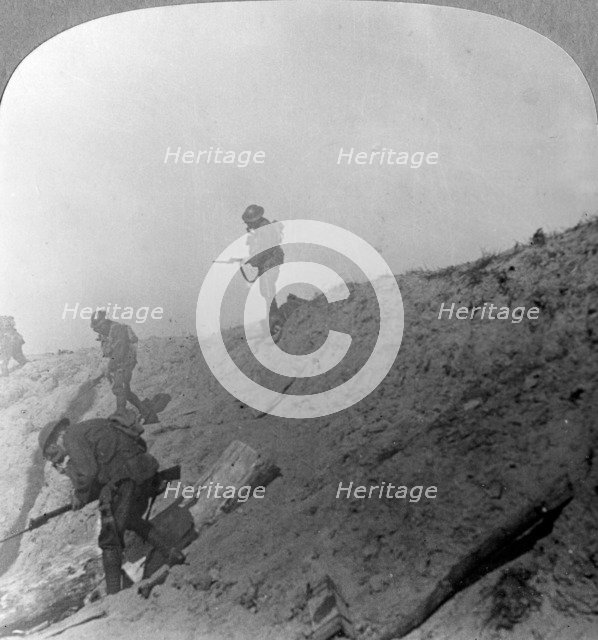 British troops advancing through gas, Passchandaele, Ypres, Belgium, World War I, c1914-c1918. Artist: Realistic Travels Publishers