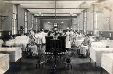 St Marylebone Infirmary, London: ward with nurses and patients, 1910. Creator: Unknown.