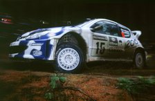 1999 Peugeot 206 WRC Network Q Rally, Gronholm. Artist: Unknown.