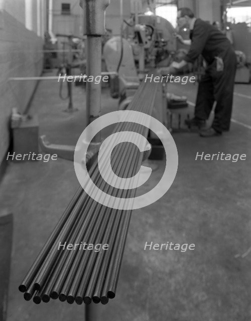 Cutting steel rods to length, Park Gate Iron & Steel Co, Rotherham, South Yorkshire, 1964. Artist: Michael Walters