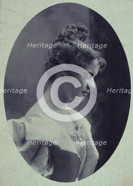 Young woman, facing right, head-and-shoulders profile portrait, c1900. Creator: Davis & Sanford.