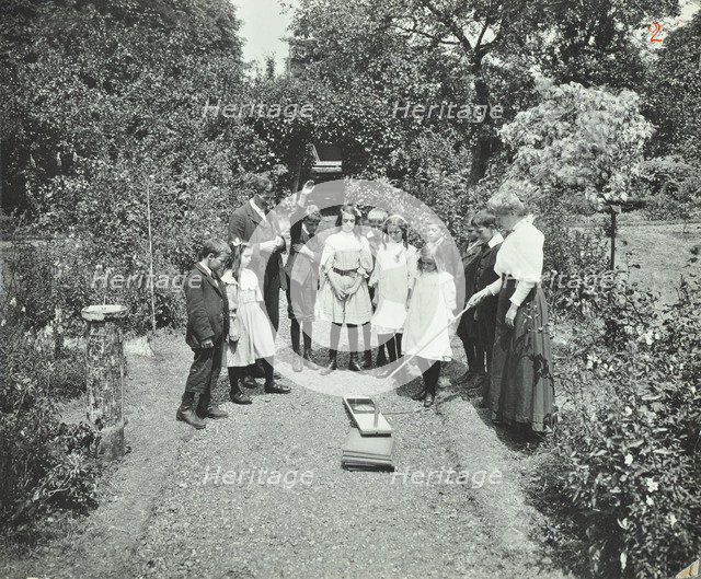 How to read a sun-dial, Birley House Open Air School, Forest Hill, London, 1908. Artist: Unknown.