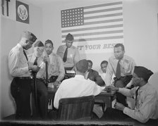 Auxiliary police at a weekly meeting, Washington, D.C., 1942. Creator: Gordon Parks.
