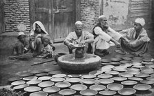 Kashmiri potters at work, 1902. Artist: Bourne & Shepherd.