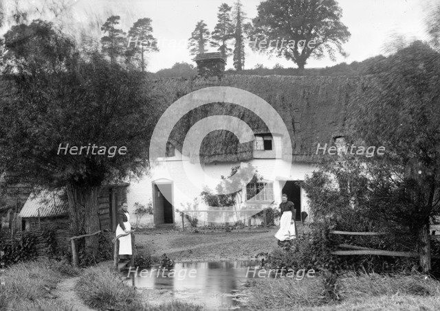 A thatched cottage by the stream, Ramsbury, Wiltshire, c1860-c1922. Artist: Henry Taunt