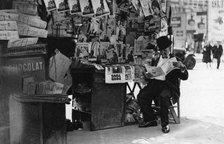 Newspaper stand, Paris, 1931.Artist: Ernest Flammarion