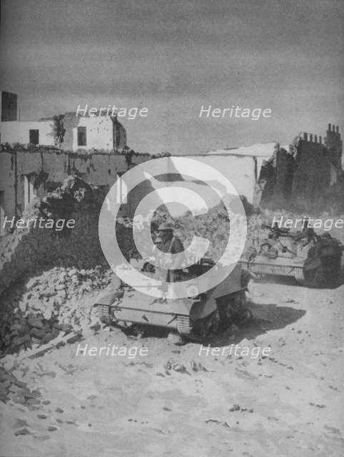 'Past Graziani's Shattered Stronghold Lies the Conquerors' Road', 1941.  Artist: Unknown.