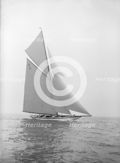 The 15-metre class 'Maudrey' sailing close-hauled, 1913. Creator: Kirk & Sons of Cowes.
