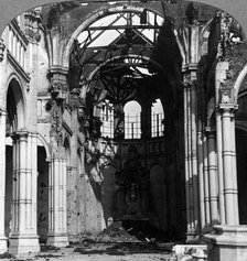 Damage to the Church of Notre Dame, Armentieres, France, World War I, 1918.Artist: Realistic Travels Publishers